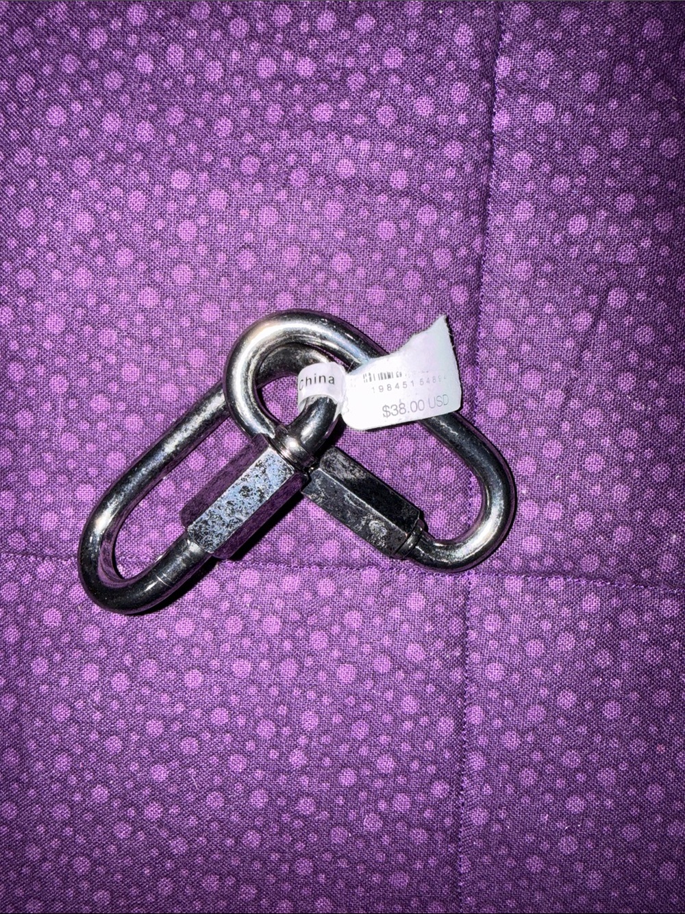 Free People Silver Metal Carabiner to connect purse chains.